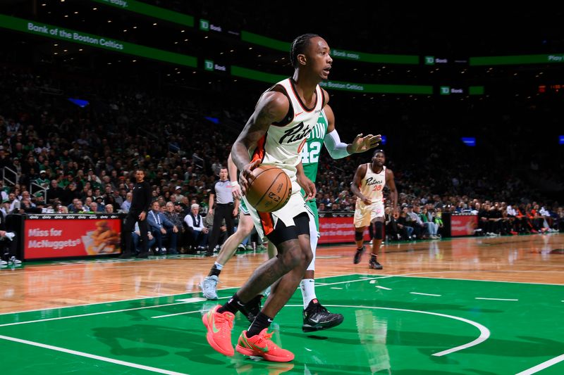 BOSTON, MA - DECEMBER 4: Ron Holland II #00 of the Detroit Pistons drives to the basket during the game against the Boston Celtics on December 4, 2024 at TD Garden in Boston, Massachusetts. NOTE TO USER: User expressly acknowledges and agrees that, by downloading and/or using this Photograph, user is consenting to the terms and conditions of the Getty Images License Agreement. Mandatory Copyright Notice: Copyright 2024 NBAE (Photo by Brian Babineau/NBAE via Getty Images)