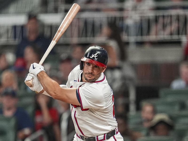 May 29, 2024; Cumberland, Georgia, USA; Atlanta Braves first baseman Matt Olson (28) watches his double hit against the Washington Nationals during the sixth inning at Truist Park. Mandatory Credit: Dale Zanine-USA TODAY Sports