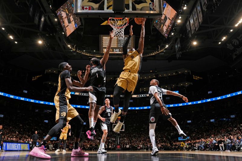 TORONTO, CANADA - JANUARY 26: RJ Barrett #9 of the Toronto Raptors drives to the basket during the game against the LA Clippers on January 26, 2024 at the Scotiabank Arena in Toronto, Ontario, Canada.  NOTE TO USER: User expressly acknowledges and agrees that, by downloading and or using this Photograph, user is consenting to the terms and conditions of the Getty Images License Agreement.  Mandatory Copyright Notice: Copyright 2024 NBAE (Photo by Mark Blinch/NBAE via Getty Images)