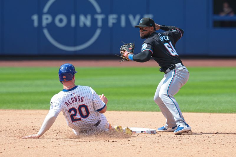 Aug 18, 2024; New York City, New York, USA; Miami Marlins second baseman Otto Lopez (61) forces out New York Mets first baseman Pete Alonso (20) at second base and throws to first to complete the double play on a ball hit by designated hitter J.D. Martinez (not pictured) during the eighth inning at Citi Field. Mandatory Credit: Vincent Carchietta-USA TODAY Sports