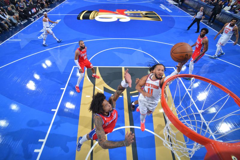 PHILADELPHIA, PA - NOVEMBER 12: Jalen Brunson #11 of the New York Knicks drives to the basket during the game against the Philadelphia 76ers during the Emirates NBA Cup game on November 12, 2024 at the Wells Fargo Center in Philadelphia, Pennsylvania NOTE TO USER: User expressly acknowledges and agrees that, by downloading and/or using this Photograph, user is consenting to the terms and conditions of the Getty Images License Agreement. Mandatory Copyright Notice: Copyright 2024 NBAE (Photo by Jesse D. Garrabrant/NBAE via Getty Images)