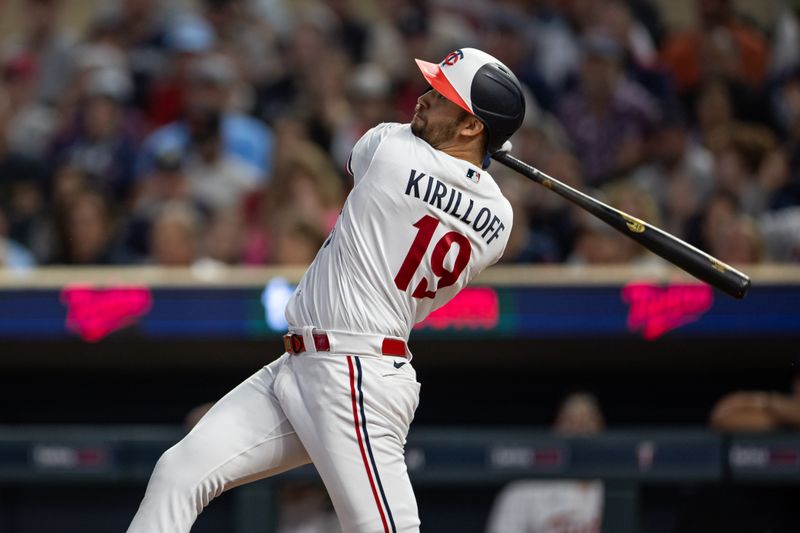 Sep 22, 2023; Minneapolis, Minnesota, USA; Minnesota Twins first baseman Alex Kirilloff (19) hits a sacrifice fly during the fourth inning against the Los Angeles Angels at Target Field. Mandatory Credit: Jordan Johnson-USA TODAY Sports