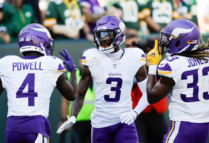 Minnesota Vikings wide receiver Jordan Addison (3) celebrates a touchdown against the Green Bay Packers during a NFL football game Sunday, Sept. 29, 2024, in Green Bay, Wis. (AP Photo/Jeffrey Phelps