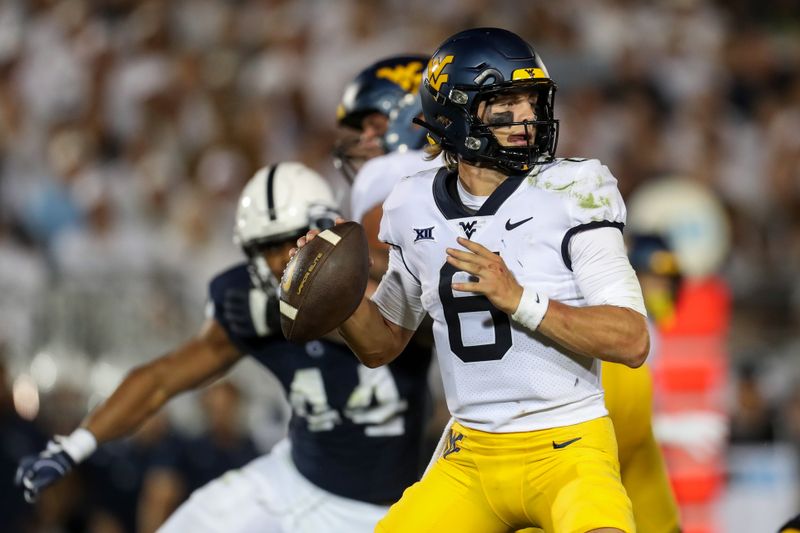 Sep 2, 2023; University Park, Pennsylvania, USA; West Virginia Mountaineers quarterback Garrett Greene (6) looks to throw a pass during the fourth quarter against the Penn State Nittany Lions at Beaver Stadium. Penn State defeated West Virginia 38-15. Mandatory Credit: Matthew O'Haren-USA TODAY Sports