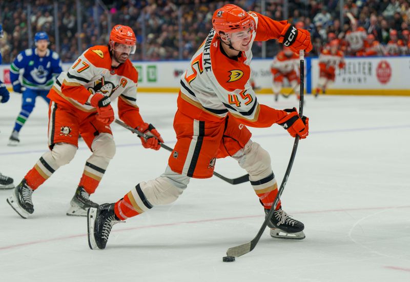 Jan 29, 2026; Vancouver, British Columbia, CAN;  Anaheim Ducks Right Wing Beckett Sennecke (45) takes a shot against the Vancouver Canucks in the third period at Rogers Arena. Mandatory Credit: Christopher Morris-Imagn Images