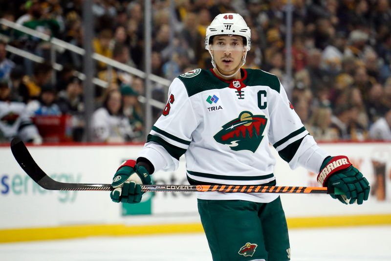 Apr 6, 2023; Pittsburgh, Pennsylvania, USA; Minnesota Wild defenseman Jared Spurgeon (46) looks on before a face-off against the Pittsburgh Penguins during the first period at PPG Paints Arena. Mandatory Credit: Charles LeClaire-USA TODAY Sports