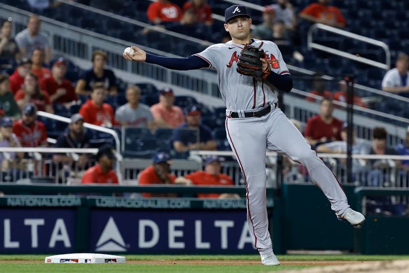 Sep 21, 2023; Washington, District of Columbia, USA; Atlanta Braves third baseman Austin Riley (27) makes a throw top first base on a ground ball hit by Washington Nationals catcher Keibert Ruiz (not pictured) during the second inning at Nationals Park. Mandatory Credit: Geoff Burke-USA TODAY Sports