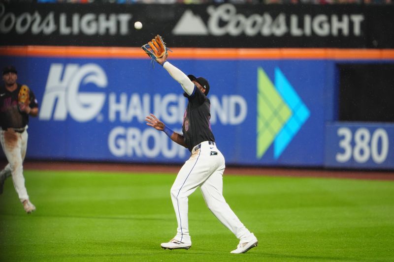 Jun 14, 2024; New York City, New York, USA;  New York Mets right fielder Starling Marte (6) catches a fly ball hit by San Diego Padres shortstop Ha-Seong Kim (not pictured) during the fifth inning at Citi Field. Mandatory Credit: Gregory Fisher-USA TODAY Sports