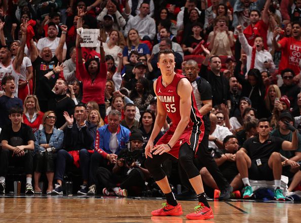 MIAMI, FL - DECEMBER 25:  Duncan Robinson #55 of the Miami Heat looks on during the game on December 25, 2023 at Kaseya Center Arena in Miami, Florida. NOTE TO USER: User expressly acknowledges and agrees that, by downloading and or using this Photograph, user is consenting to the terms and conditions of the Getty Images License Agreement. Mandatory Copyright Notice: Copyright 2023 NBAE (Photo by Issac Baldizon/NBAE via Getty Images)