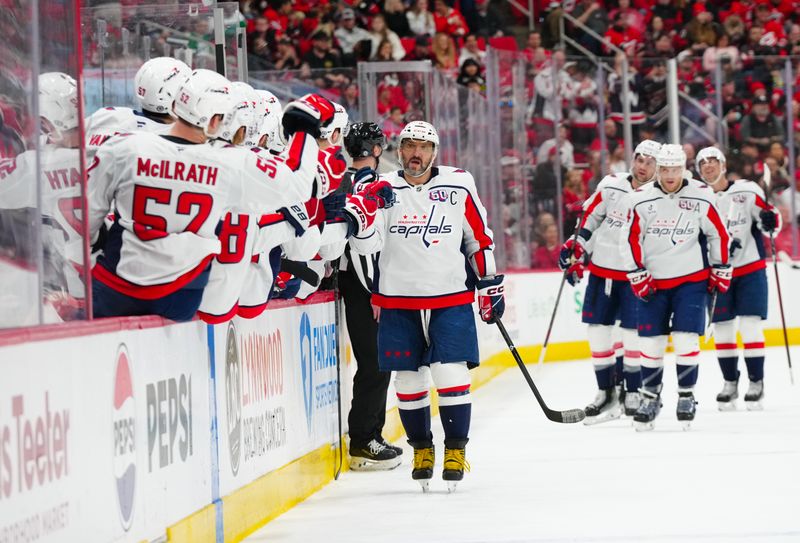 Nov 3, 2024; Raleigh, North Carolina, USA;  Washington Capitals left wing Alex Ovechkin (8) celebrates his goal during the first period against the Carolina Hurricanes at Lenovo Center. Mandatory Credit: James Guillory-Imagn Images