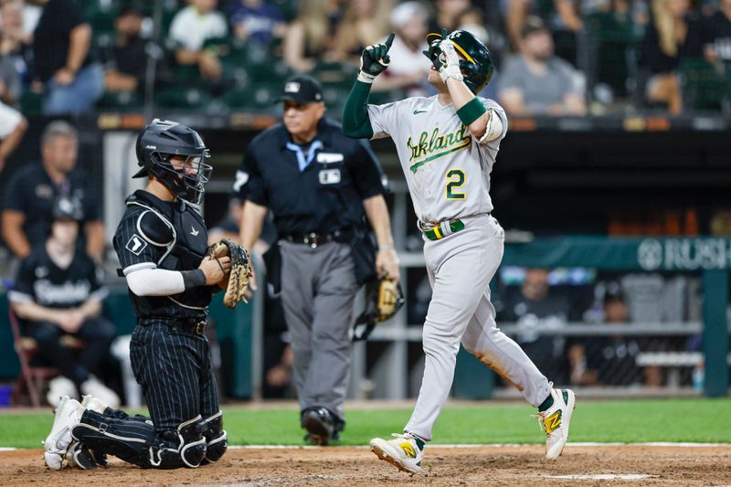 Aug 25, 2023; Chicago, Illinois, USA; Oakland Athletics shortstop Nick Allen (2) crosses home plate after hitting a solo home run against the Chicago White Sox during the seventh inning at Guaranteed Rate Field. Mandatory Credit: Kamil Krzaczynski-USA TODAY Sports