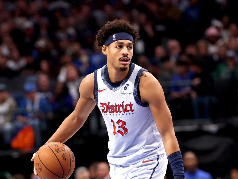 DALLAS, TEXAS - JANUARY 27: Jordan Poole #13 of the Washington Wizards dribbles the ball against the Dallas Mavericks during the second quarter at American Airlines Center on January 27, 2025 in Dallas, Texas. NOTE TO USER: User expressly acknowledges and agrees that, by downloading and or using this photograph, User is consenting to the terms and conditions of the Getty Images License Agreement. (Photo by Tim Heitman/Getty Images)