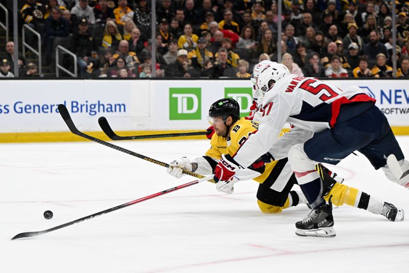 Mar 7, 2026; Boston, Massachusetts, USA; Boston Bruins left wing Viktor Arvidsson (71) skates against Washington Capitals defenseman Trevor van Riemsdyk (57) during the first period at the TD Garden. Mandatory Credit: Brian Fluharty-Imagn Images