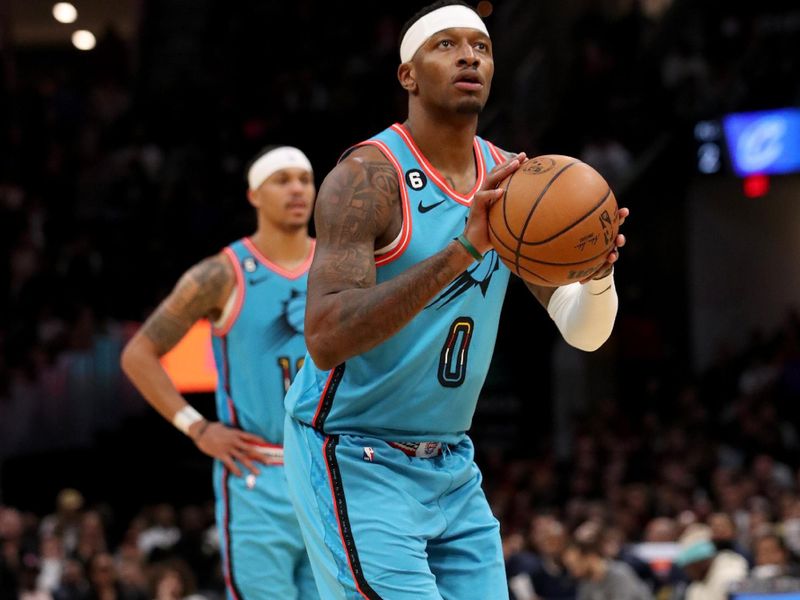 CLEVELAND, OH - JANUARY 4: Torrey Craig #0 of the Phoenix Suns prepares to shoot a free throw against the Cleveland Cavaliers on January 4, 2023 at Rocket Mortgage FieldHouse in Cleveland, Ohio. NOTE TO USER: User expressly acknowledges and agrees that, by downloading and/or using this Photograph, user is consenting to the terms and conditions of the Getty Images License Agreement. Mandatory Copyright Notice: Copyright 2022 NBAE (Photo by Lauren Bacho/NBAE via Getty Images)