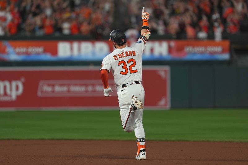 Jun 24, 2025; Baltimore, Maryland, USA; Baltimore Orioles designated hitter Ryan O’Hearn (32) rounds the bases following his solo home run during the seventh inning against the Texas Rangers at Oriole Park at Camden Yards. Mandatory Credit: Mitch Stringer-Imagn Images