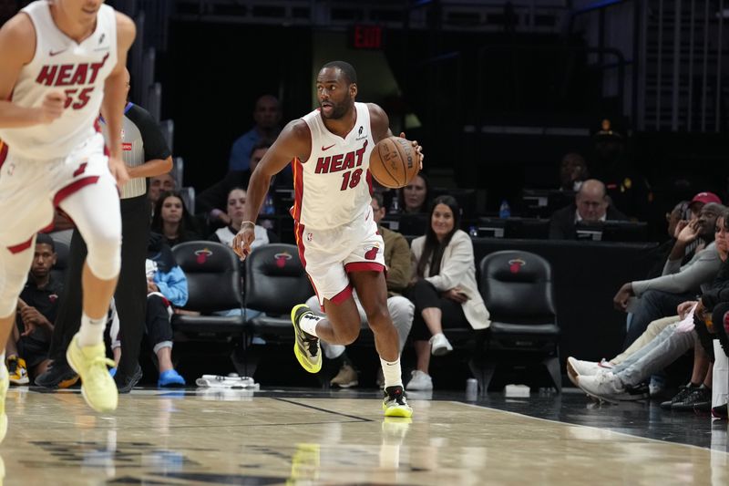 MIAMI, FL - OCTOBER 16: Alec Burks #18 of the Miami Heat dribbles the ball during the game against the Atlanta Hawks during a preseason game on October 16, 2024 at Kaseya Center in Miami, Florida. NOTE TO USER: User expressly acknowledges and agrees that, by downloading and or using this Photograph, user is consenting to the terms and conditions of the Getty Images License Agreement. Mandatory Copyright Notice: Copyright 2024 NBAE (Photo by Eric Espada/NBAE via Getty Images)