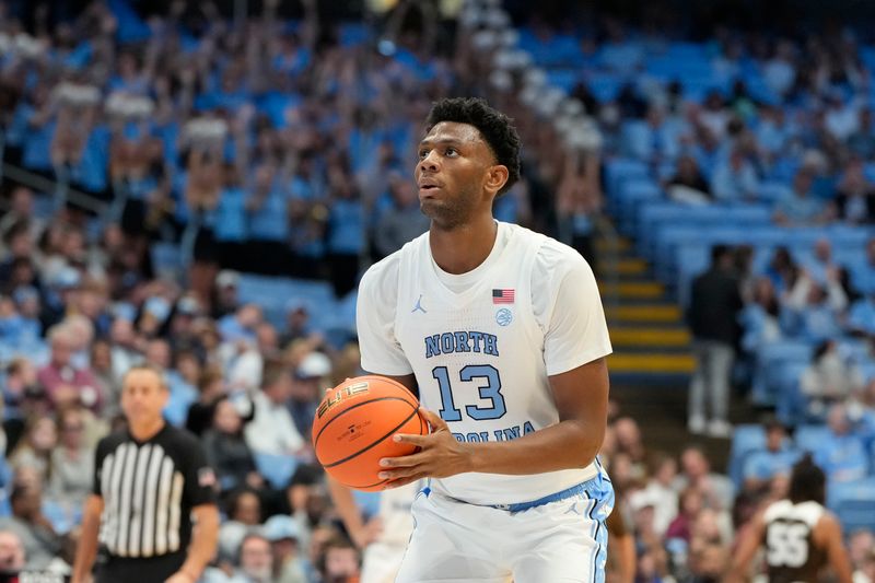 Nov 12, 2023; Chapel Hill, North Carolina, USA; North Carolina Tar Heels forward Jalen Washington (13) at the foul line in the second half at Dean E. Smith Center. Mandatory Credit: Bob Donnan-USA TODAY Sports