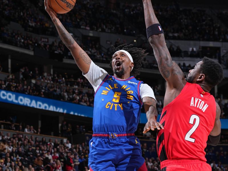 DENVER, CO - FEBRUARY 2: Kentavious Caldwell-Pope #5 of the Denver Nuggets drives to the basket during the game against the Portland Trail Blazers on February 2, 2024 at the Ball Arena in Denver, Colorado. NOTE TO USER: User expressly acknowledges and agrees that, by downloading and/or using this Photograph, user is consenting to the terms and conditions of the Getty Images License Agreement. Mandatory Copyright Notice: Copyright 2024 NBAE (Photo by Garrett Ellwood/NBAE via Getty Images)