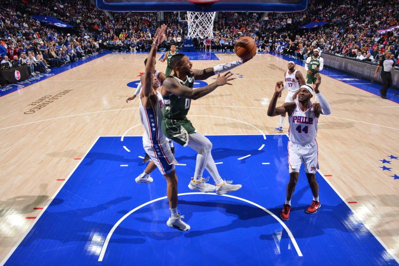 PHILADELPHIA, PA - FEBRUARY 25: Damian Lillard #0 of the Milwaukee Bucks drives to the basket during the game against the Philadelphia 76ers on February 25, 2024 at the Wells Fargo Center in Philadelphia, Pennsylvania NOTE TO USER: User expressly acknowledges and agrees that, by downloading and/or using this Photograph, user is consenting to the terms and conditions of the Getty Images License Agreement. Mandatory Copyright Notice: Copyright 2024 NBAE (Photo by Jesse D. Garrabrant/NBAE via Getty Images)