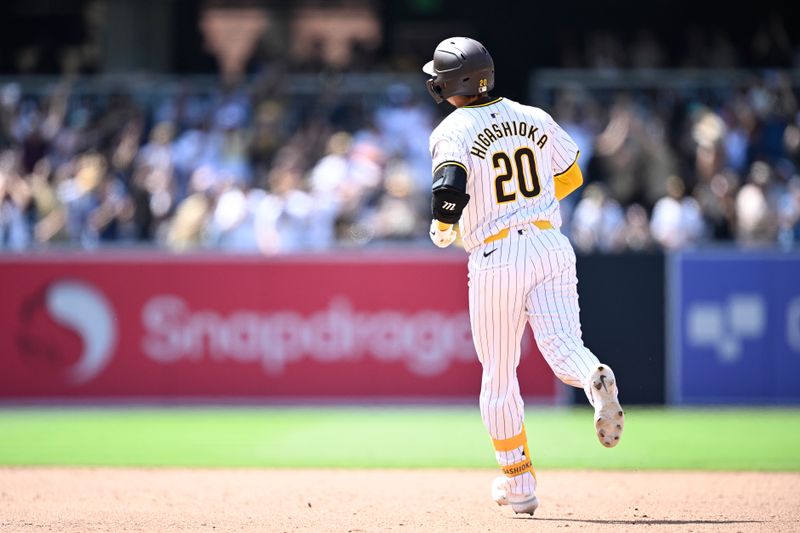 Jun 26, 2024; San Diego, California, USA; San Diego Padres catcher Kyle Higashioka (20) rounds the bases after hitting a grand slam home run against the Washington Nationals during the eighth inning at Petco Park. Mandatory Credit: Orlando Ramirez-USA TODAY Sports