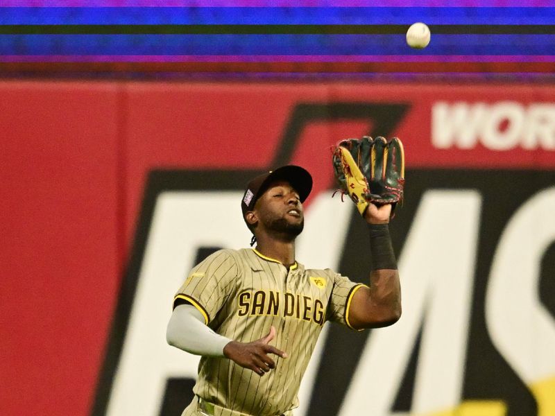 Jul 20, 2024; Cleveland, Ohio, USA; San Diego Padres left fielder Jurickson Profar (10) catches a ball hit by Cleveland Guardians third baseman Jose Ramirez (not pictured) during the seventh inning at Progressive Field. Mandatory Credit: Ken Blaze-USA TODAY Sports