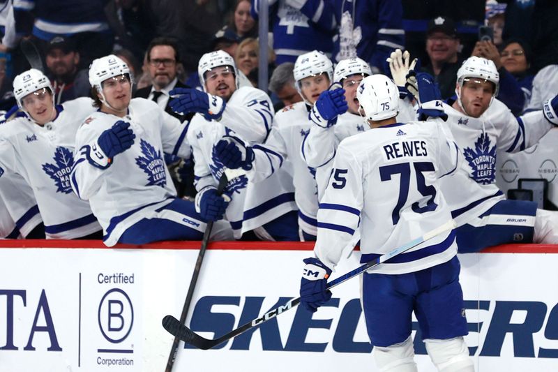 Jan 27, 2024; Winnipeg, Manitoba, CAN; Toronto Maple Leafs right wing Ryan Reaves (75) celebrates his first period goal against the Winnipeg Jets at Canada Life Centre. Mandatory Credit: James Carey Lauder-USA TODAY Sports