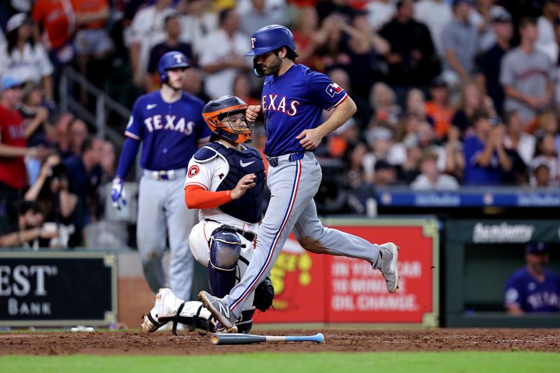 Jul 13, 2024; Houston, Texas, USA; Texas Rangers third baseman Josh Smith (8) crosses home plate to score a run against the Houston Astros during the tenth inning at Minute Maid Park. Mandatory Credit: Erik Williams-USA TODAY Sports