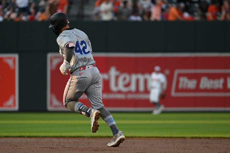 Apr 15, 2024; Baltimore, Maryland, USA; Minnesota Twins third baseman Jose Miranda   rounds the bases after hitting a solo home run in the second inning against the Baltimore Orioles  at Oriole Park at Camden Yards. Mandatory Credit: Tommy Gilligan-USA TODAY Sports