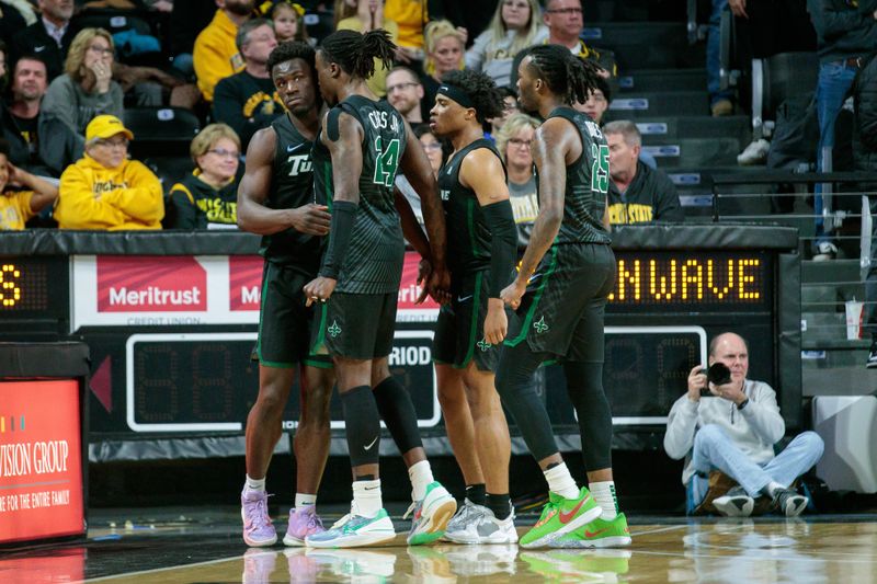 Jan 25, 2023; Wichita, Kansas, USA; Tulane Green Wave celebrate after a play during the second half against the Wichita State Shockers at Charles Koch Arena. Mandatory Credit: William Purnell-USA TODAY Sports