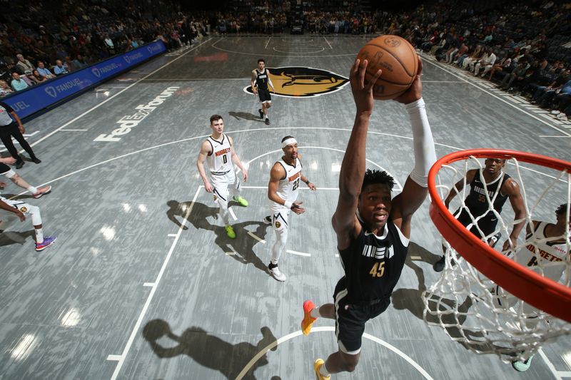 MEMPHIS, TN - APRIL 14:  GG Jackson #45 of the Memphis Grizzlies dunks the ball during the game against the Denver Nuggets on April 14, 2024 at FedExForum in Memphis, Tennessee. NOTE TO USER: User expressly acknowledges and agrees that, by downloading and or using this photograph, User is consenting to the terms and conditions of the Getty Images License Agreement. Mandatory Copyright Notice: Copyright 2024 NBAE (Photo by Joe Murphy/NBAE via Getty Images)