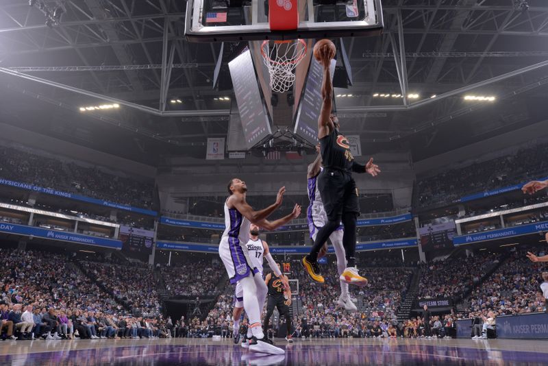 SACRAMENTO, CA - MARCH 19:  Donovan Mitchell #45 of the Cleveland Cavaliers drives to the basket during the game against the Sacramento Kings  on March 19, 2025 at Golden 1 Center in Sacramento, California. NOTE TO USER: User expressly acknowledges and agrees that, by downloading and or using this Photograph, user is consenting to the terms and conditions of the Getty Images License Agreement. Mandatory Copyright Notice: Copyright 2025 NBAE (Photo by Rocky Widner/NBAE via Getty Images)
