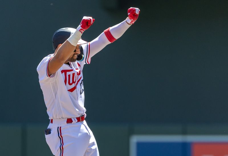 Aug 16, 2023; Minneapolis, Minnesota, USA; Minnesota Twins third baseman Royce Lewis (23) celebrates after hitting a RBI double against the Detroit Tigers in the first inning at Target Field. Mandatory Credit: Jesse Johnson-USA TODAY Sports