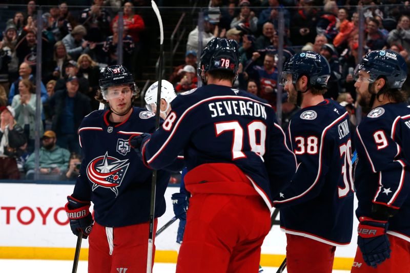 Jan 15, 2026; Columbus, Ohio, USA; Columbus Blue Jackets center Kent Johnson (91) celebrates after his goal against the Vancouver Canucks during the third period at Nationwide Arena. Mandatory Credit: Russell LaBounty-Imagn Images