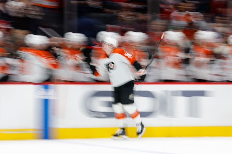 Mar 1, 2024; Washington, District of Columbia, USA; Philadelphia Flyers right wing Owen Tippett (74) celebrates with teammates after scoring a goal against the Washington Capitals in the first period at Capital One Arena. Mandatory Credit: Geoff Burke-USA TODAY Sports