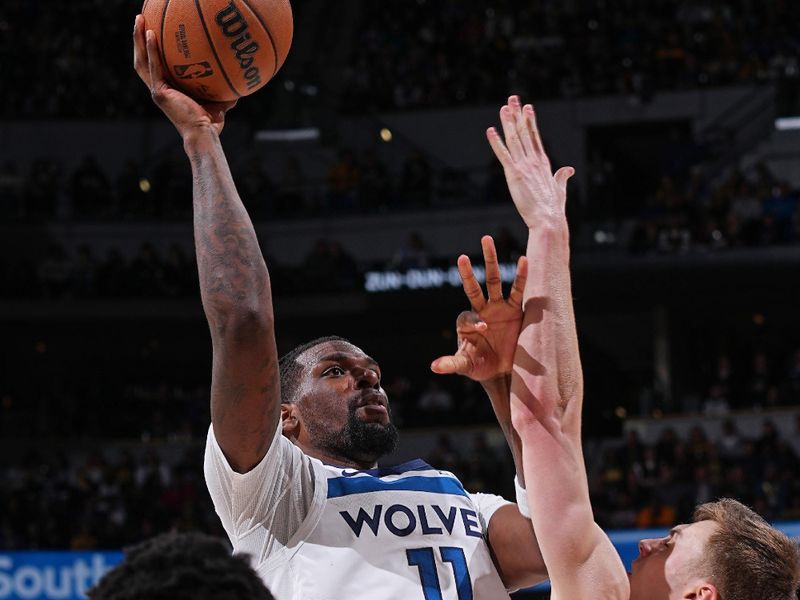 DENVER, CO - APRIL 10:Naz Reid #11 of the Minnesota Timberwolves shoots the ball during the game against the Denver Nuggets  on April 10, 2024 at the Ball Arena in Denver, Colorado. NOTE TO USER: User expressly acknowledges and agrees that, by downloading and/or using this Photograph, user is consenting to the terms and conditions of the Getty Images License Agreement. Mandatory Copyright Notice: Copyright 2024 NBAE (Photo by Bart Young/NBAE via Getty Images)