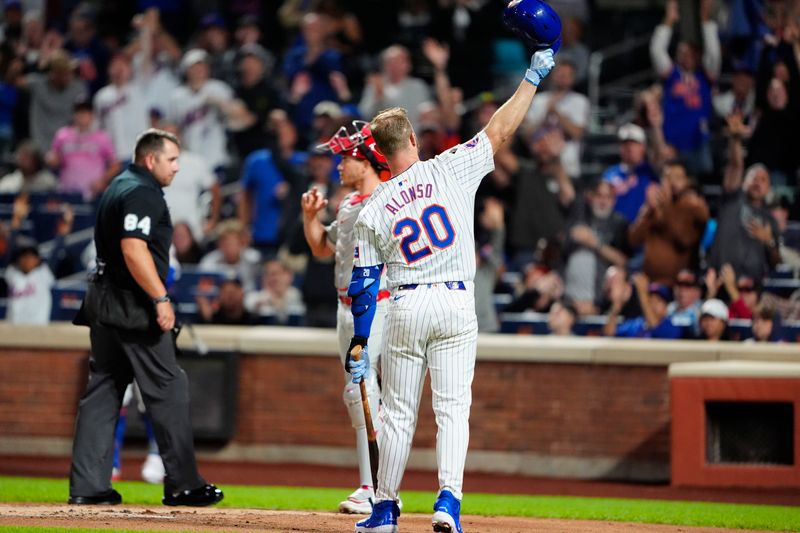 Sep 22, 2024; New York City, New York, USA;  New York Mets first baseman Pete Alonso (20) acknowledges the crowd as he comes up to bat against the Philadelphia Phillies during the first inning at Citi Field. Mandatory Credit: Gregory Fisher-Imagn Images