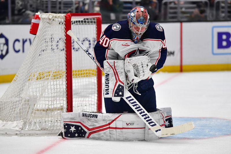 Mar 16, 2023; Los Angeles, California, USA; Columbus Blue Jackets goaltender Daniil Tarasov (40) blocks a shot against the Los Angeles Kings during the second period at Crypto.com Arena. Mandatory Credit: Gary A. Vasquez-USA TODAY Sports