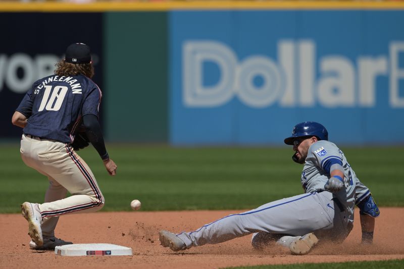 Jun 6, 2024; Cleveland, Ohio, USA; Kansas City Royals first baseman Vinnie Pasquantino (9) slides into second with a double as 
Cleveland Guardians shortstop Daniel Schneemann (10) waits for the throw during the seventh inning at Progressive Field. Mandatory Credit: Ken Blaze-USA TODAY Sports