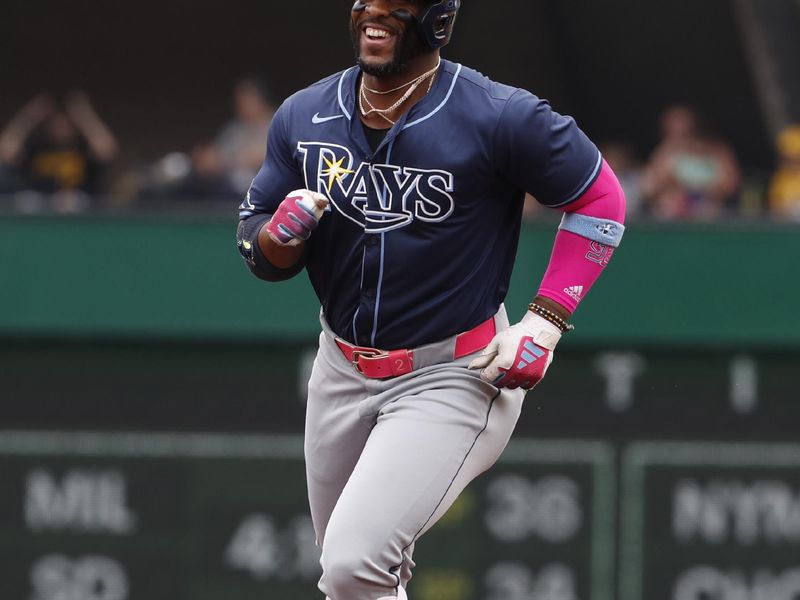 Jun 23, 2024; Pittsburgh, Pennsylvania, USA;  Tampa Bay Rays first baseman Yandy Díaz (2) circles the bases on a solo home run against the Pittsburgh Pirates during the first inning at PNC Park. Mandatory Credit: Charles LeClaire-USA TODAY Sports