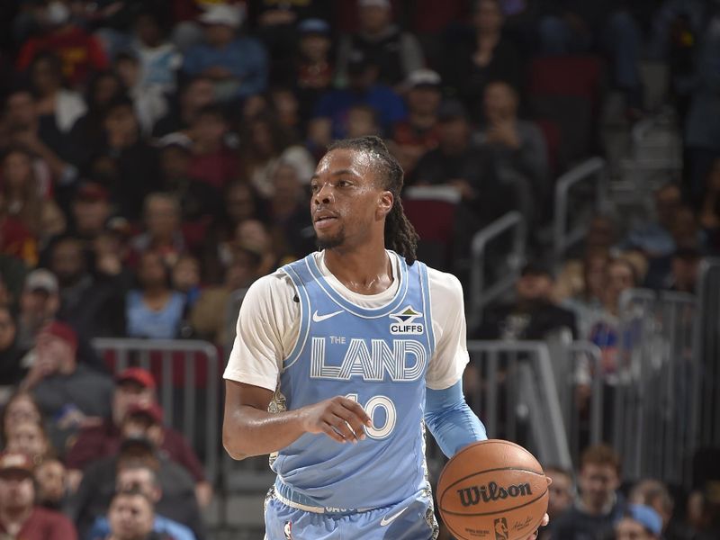 CLEVELAND, OH - NOVEMBER 17: Darius Garland #10 of the Cleveland Cavaliers dribbles the ball during the game against the Charlotte Hornets on November 17, 2024 at Rocket Mortgage FieldHouse in Cleveland, Ohio. NOTE TO USER: User expressly acknowledges and agrees that, by downloading and/or using this Photograph, user is consenting to the terms and conditions of the Getty Images License Agreement. Mandatory Copyright Notice: Copyright 2024 NBAE (Photo by David Liam Kyle/NBAE via Getty Images)