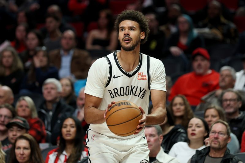 PORTLAND, OREGON - JANUARY 14: Cameron Johnson #2 of the Brooklyn Nets looks to shoot during the second half against the Portland Trail Blazers at Moda Center on January 14, 2025 in Portland, Oregon. NOTE TO USER: User expressly acknowledges and agrees that, by downloading and or using this photograph, User is consenting to the terms and conditions of the Getty Images License Agreement. (Photo by Steph Chambers/Getty Images)