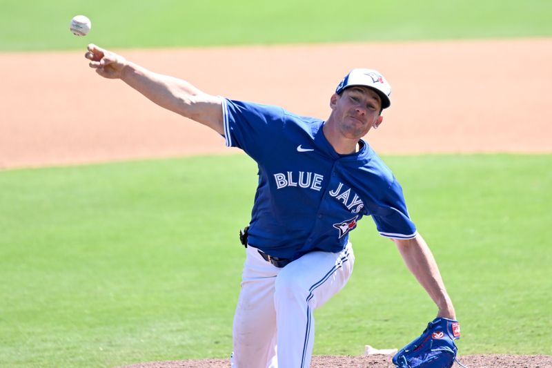 Mar 11, 2025; Dunedin, Florida, USA; Toronto Blue Jays starting pitcher Chris Bassitt (40) throws a pitch in the fourth inning against the Minnesota Twins during spring training  at TD Ballpark. Mandatory Credit: Jonathan Dyer-Imagn Images