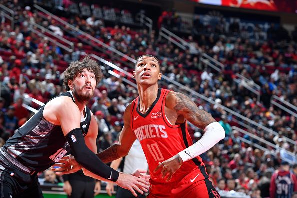 HOUSTON, TX - DECEMBER 11: Jabari Smith Jr. #10 of the Houston Rockets waits for a rebound during the game against the San Antonio Spurs on December 11, 2023 at the Toyota Center in Houston, Texas. NOTE TO USER: User expressly acknowledges and agrees that, by downloading and or using this photograph, User is consenting to the terms and conditions of the Getty Images License Agreement. Mandatory Copyright Notice: Copyright 2023 NBAE (Photo by Logan Riely/NBAE via Getty Images)