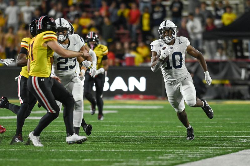 Nov 4, 2023; College Park, Maryland, USA;  Penn State Nittany Lions running back Nicholas Singleton (10) returns a second half kickoff against the Maryland Terrapins at SECU Stadium. Mandatory Credit: Tommy Gilligan-USA TODAY Sports