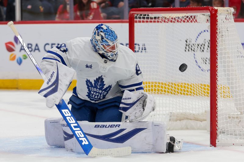 Dec 2, 2025; Sunrise, Florida, USA; Toronto Maple Leafs goaltender Joseph Woll (60) makes a save against the Florida Panthers during the first period at Amerant Bank Arena. Mandatory Credit: Sam Navarro-Imagn Images