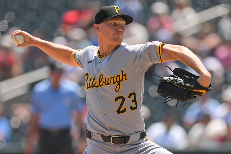 Jul 13, 2025; Minneapolis, Minnesota, USA;  Pittsburgh Pirates starting pitcher Mitch Keller (23) delivers a pitch against the Minnesota Twins during the second  inning at Target Field. Mandatory Credit: Nick Wosika-Imagn Images
