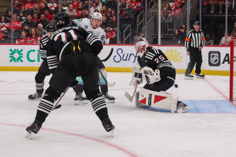 Jan 14, 2026; Newark, New Jersey, USA; Seattle Kraken defenseman Adam Larsson (6) (not pictured) scores a goal on New Jersey Devils goaltender Jacob Markstrom (25) during the first period at Prudential Center. Mandatory Credit: Ed Mulholland-Imagn Images