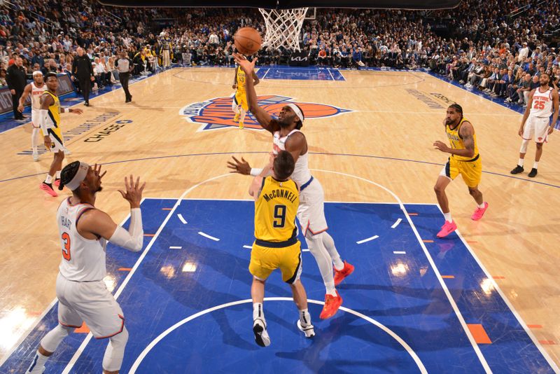 NEW YORK, NY - MAY 29:  Precious Achiuwa #5 of the New York Knicks shoots the ball during the game against the Indiana Pacers  during Game 5 of the 2025 Eastern Conference Finals  on May 29, 2025 at Madison Square Garden in New York City, New York.  NOTE TO USER: User expressly acknowledges and agrees that, by downloading and or using this photograph, User is consenting to the terms and conditions of the Getty Images License Agreement. Mandatory Copyright Notice: Copyright 2025 NBAE  (Photo by Jesse D. GarrabrantNBAE via Getty Images)
