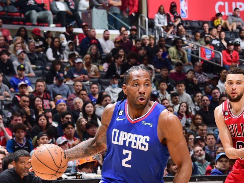 LOS ANGELES, CA - MARCH 27: Kawhi Leonard #2 of the LA Clippers moves the ball during the game against the Chicago Bulls on March 27, 2023 at Crypto.Com Arena in Los Angeles, California. NOTE TO USER: User expressly acknowledges and agrees that, by downloading and/or using this Photograph, user is consenting to the terms and conditions of the Getty Images License Agreement. Mandatory Copyright Notice: Copyright 2023 NBAE (Photo by Adam Pantozzi/NBAE via Getty Images)