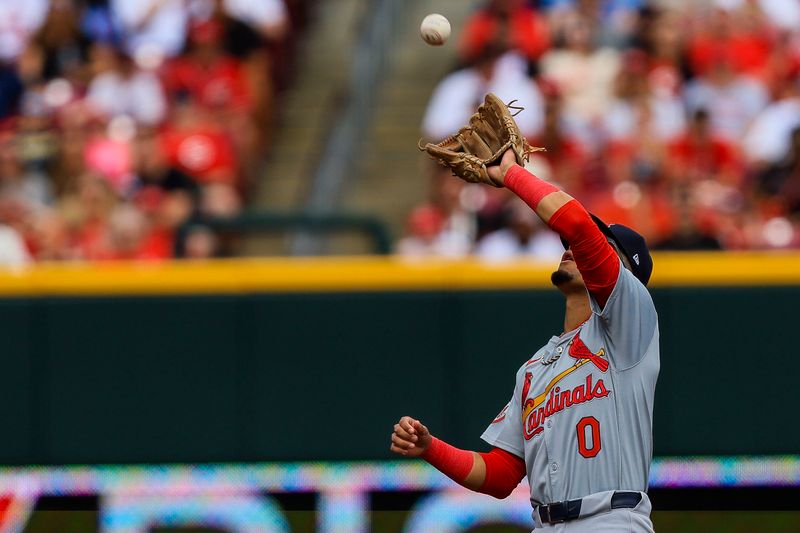 May 27, 2024; Cincinnati, Ohio, USA; St. Louis Cardinals shortstop Masyn Winn (0) catches a pop up hit by Cincinnati Reds shortstop Elly De La Cruz (not pictured) in the first inning at Great American Ball Park. Mandatory Credit: Katie Stratman-USA TODAY Sports